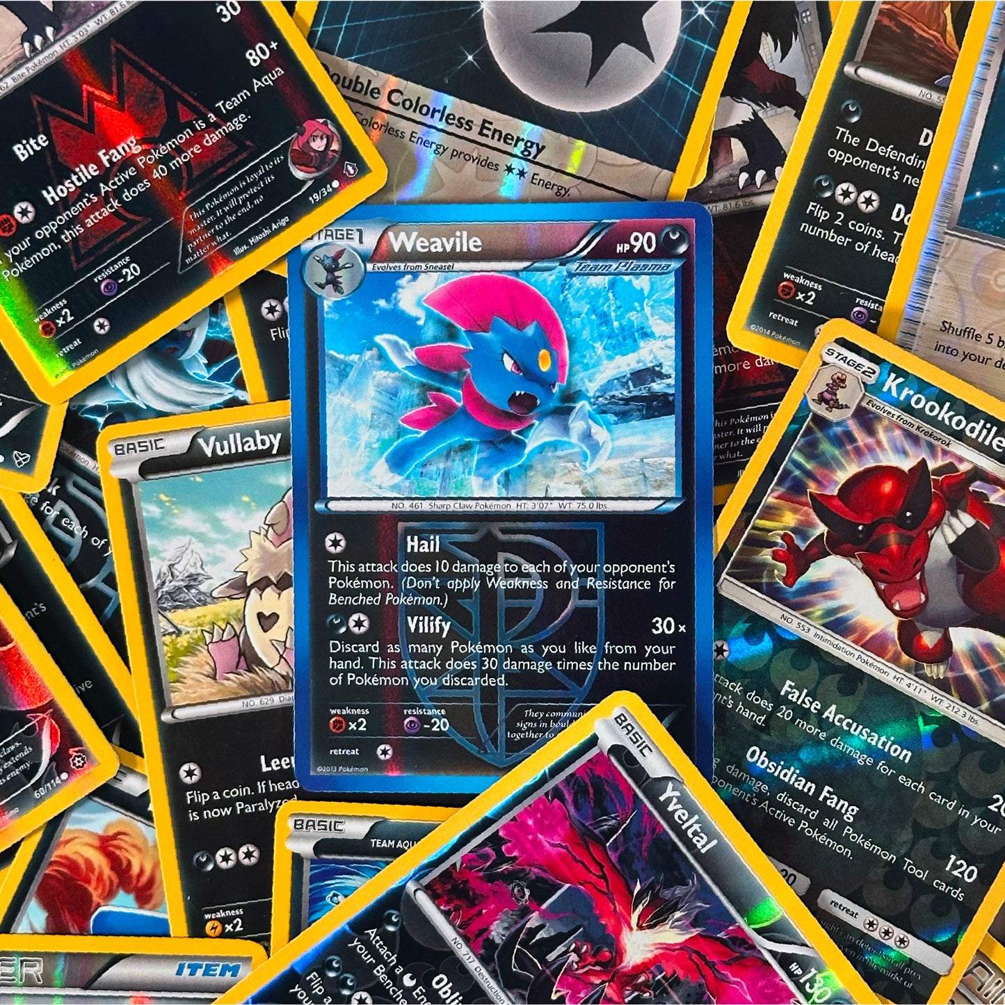 Collection of various trading cards with different characters and text.