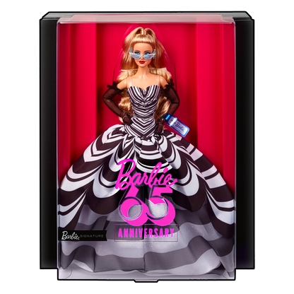 Barbie doll in a black and white striped dress with 'Barbie 65th Anniversary' text in a packaging box.
