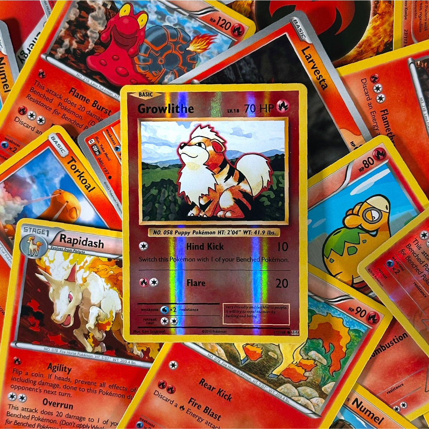 Collection of colorful trading cards featuring various characters and text.