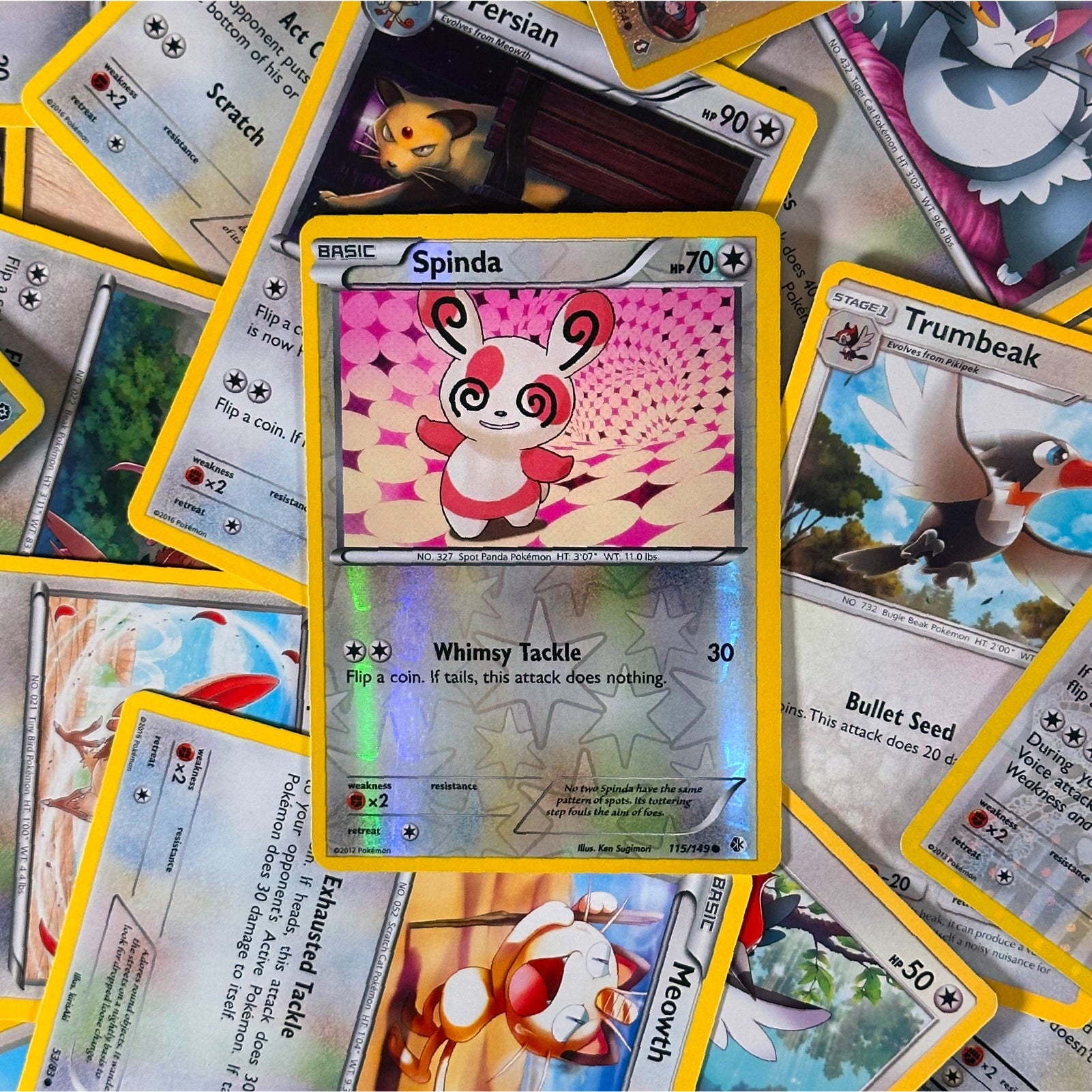 Collection of colorful trading cards featuring various characters and text