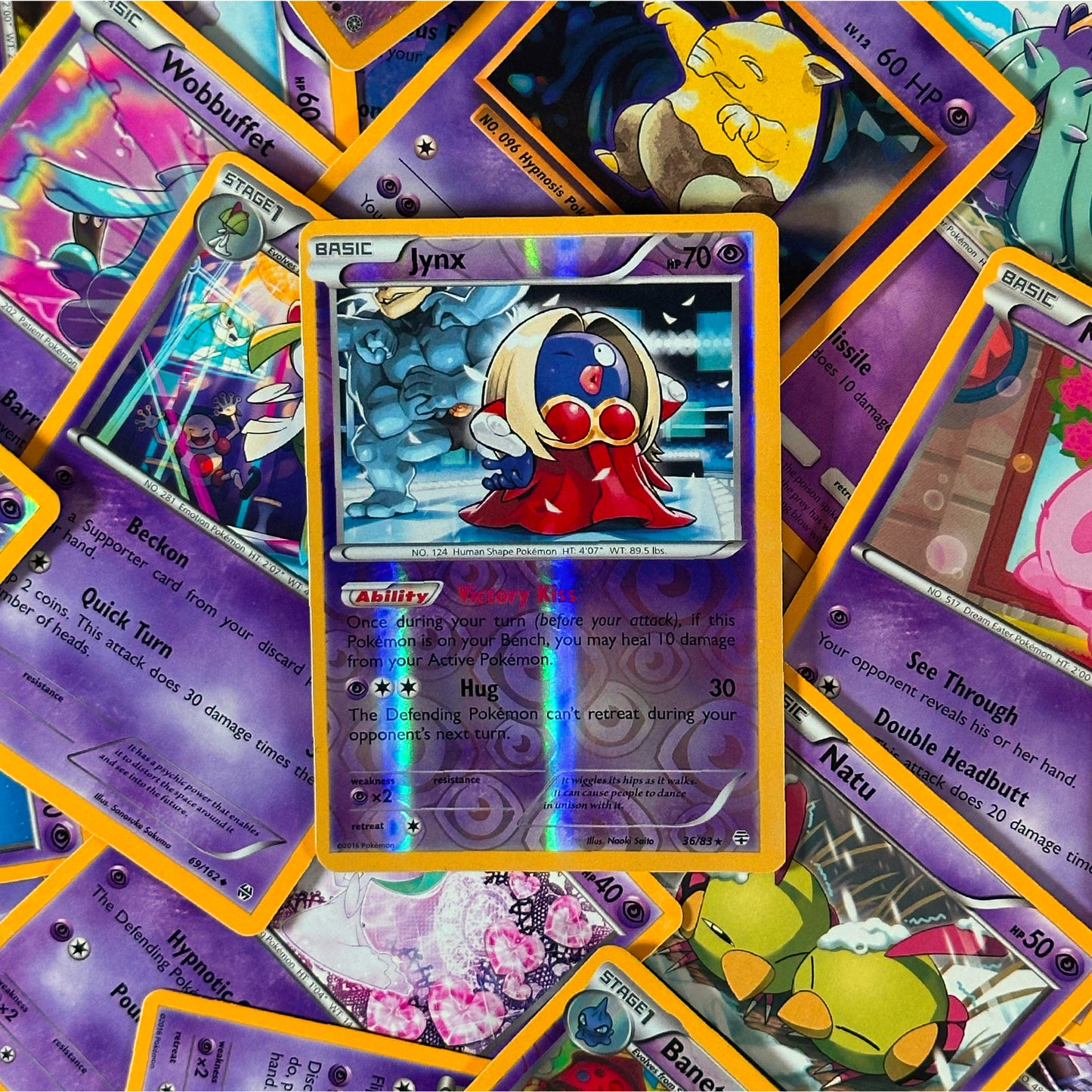 Collection of colorful trading cards with a central card featuring a Jynx character.