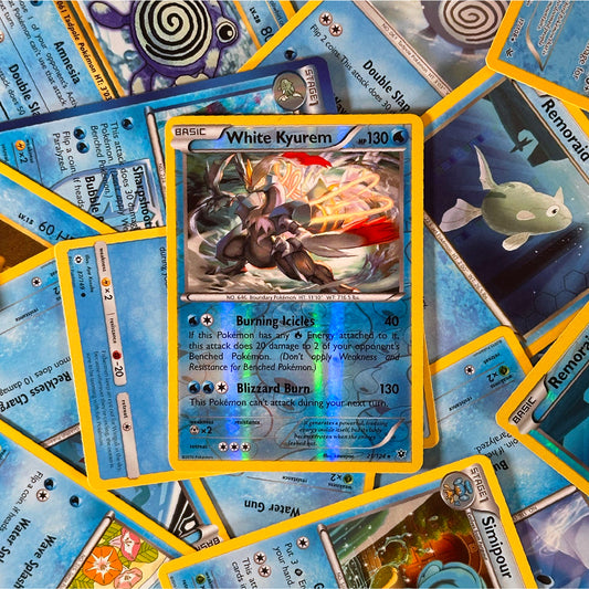 Collection of trading cards featuring various characters and text